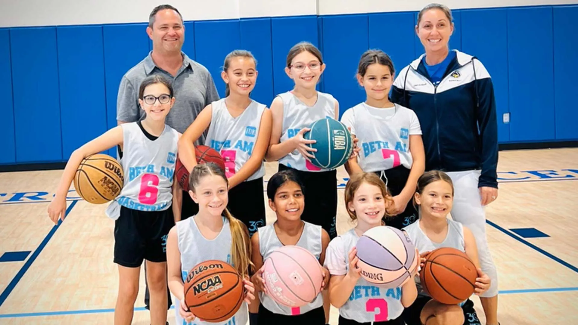 Girls team with coaches