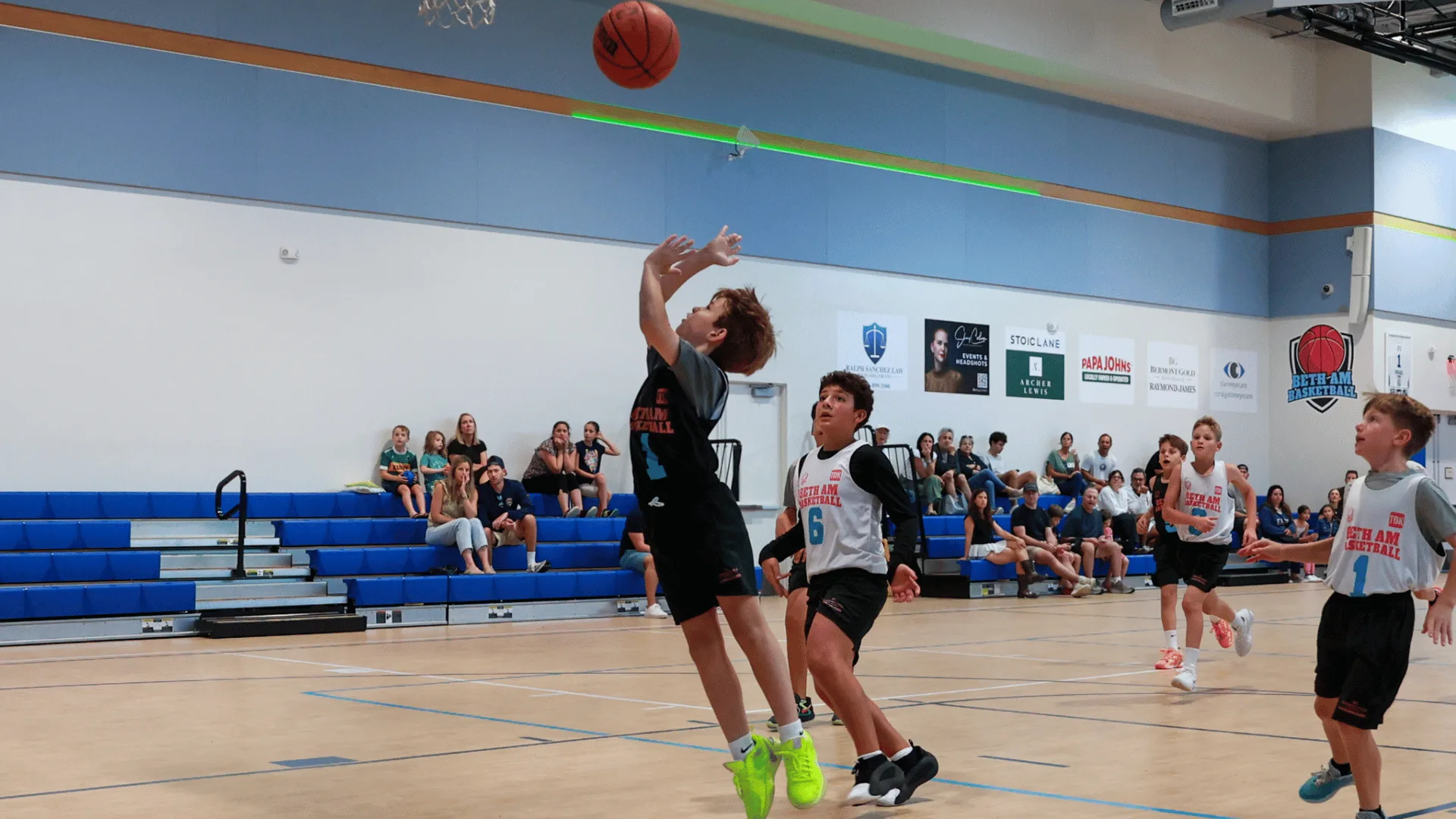 Boys playing basketball