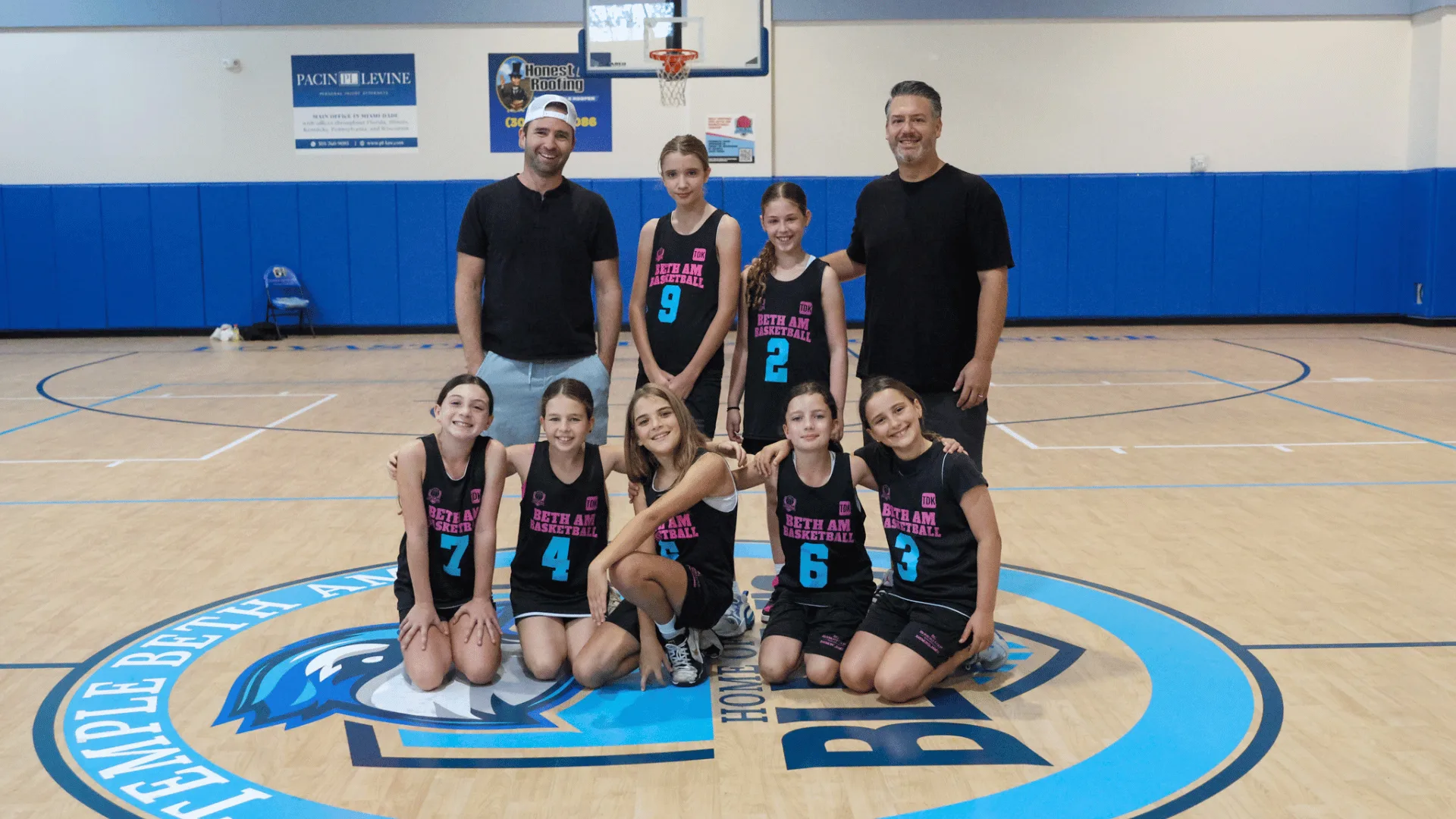 Girls team with coaches