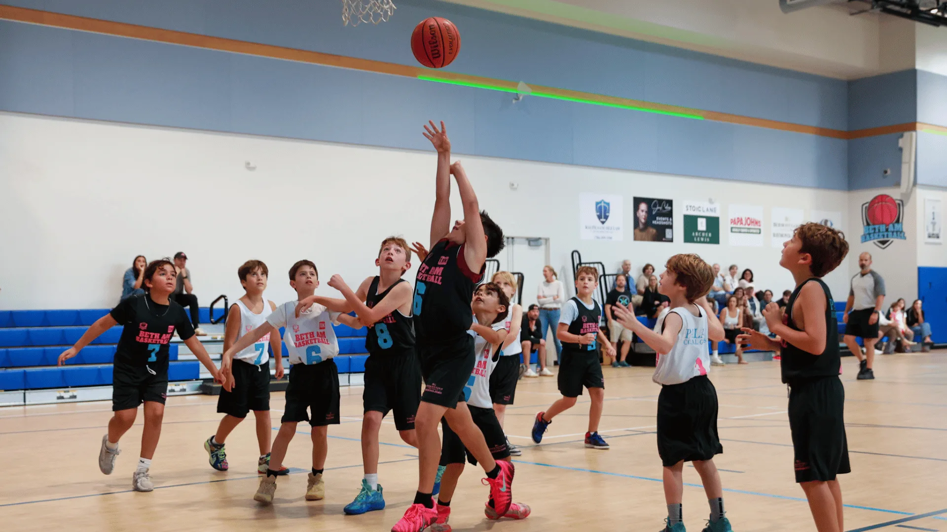 Boys playing basketball